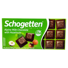 Шоколад молочний Schogetten Alpine Milk Chocolate with Hazelnuts - C шматочками лісового горіха 100 г 5102 фото Деліціо фуд