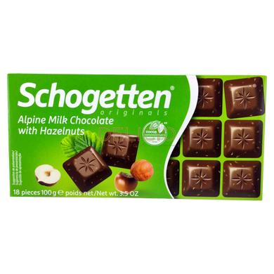 Шоколад молочний Schogetten Alpine Milk Chocolate with Hazelnuts - C шматочками лісового горіха 100 г 5102 фото Деліціо фуд
